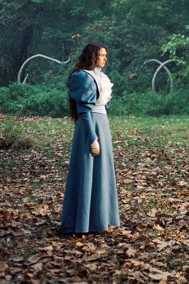 Blue-grey Victorian gown, garden