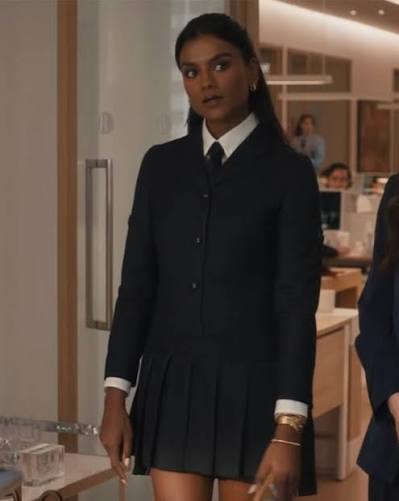 Navy blazer and pleated mini skirt